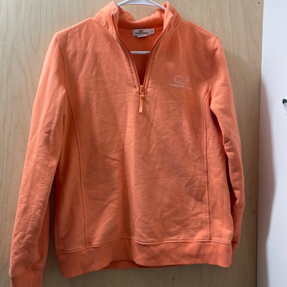 Good condition. Worn. Tiny stain on the front.